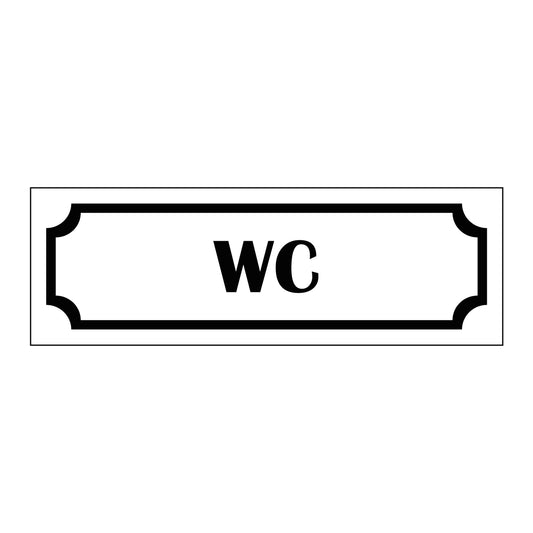 Märkskylt "WC" i vit färg